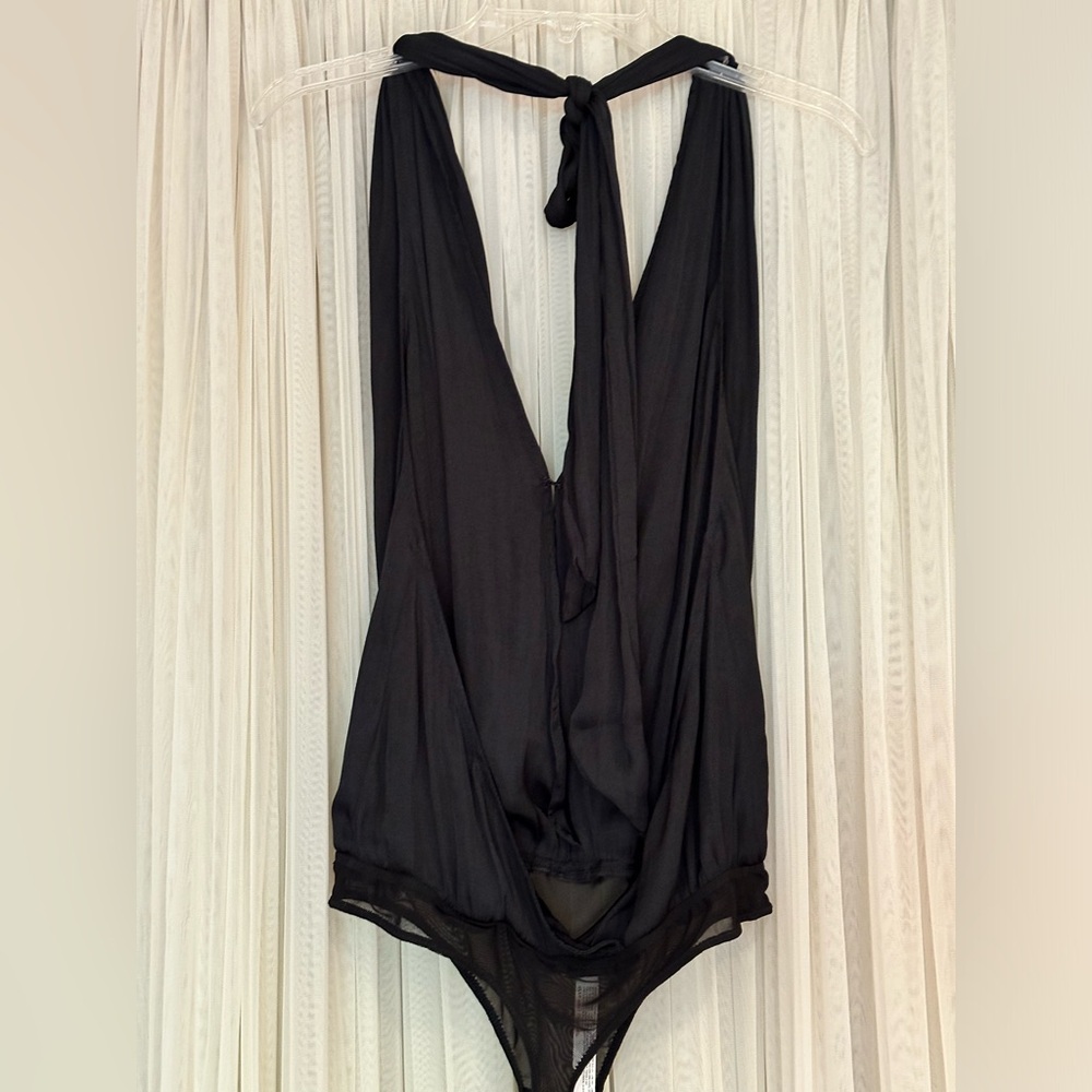 Free people size small black open back body suit
